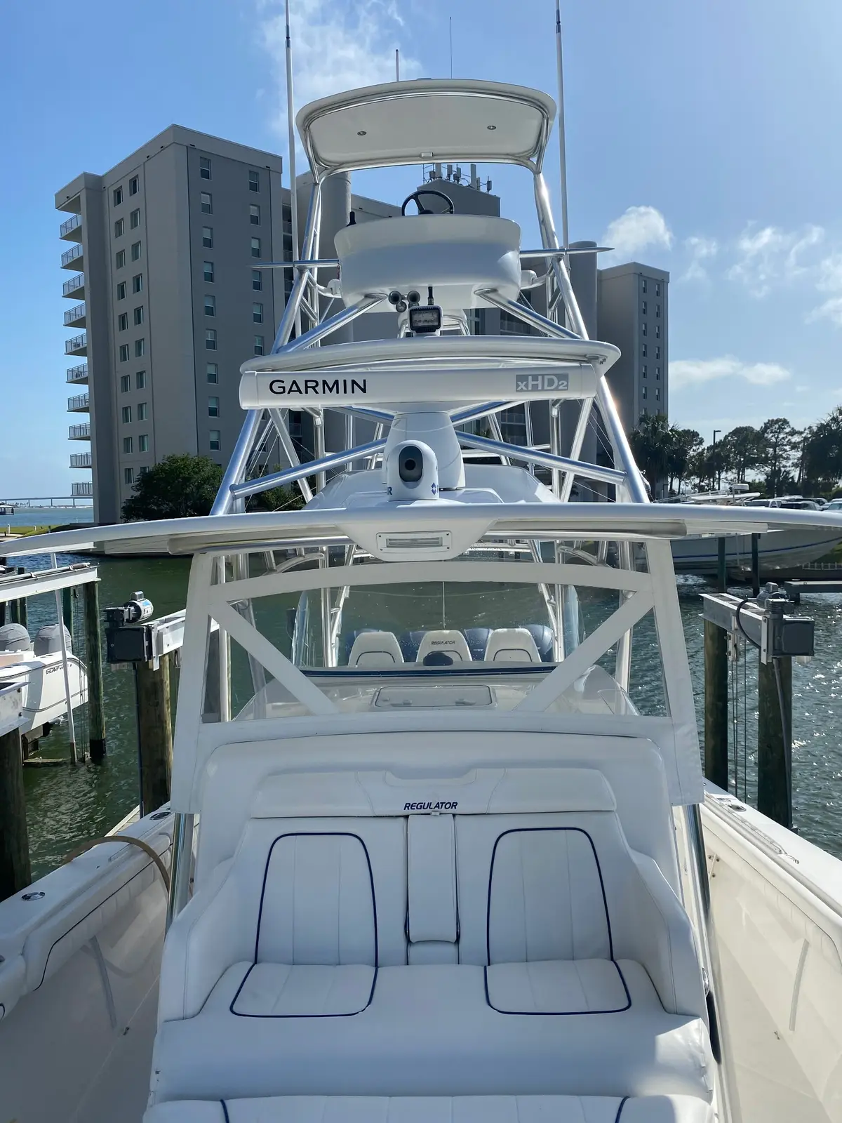 Detailed white boat cockpit and tower at the marina
